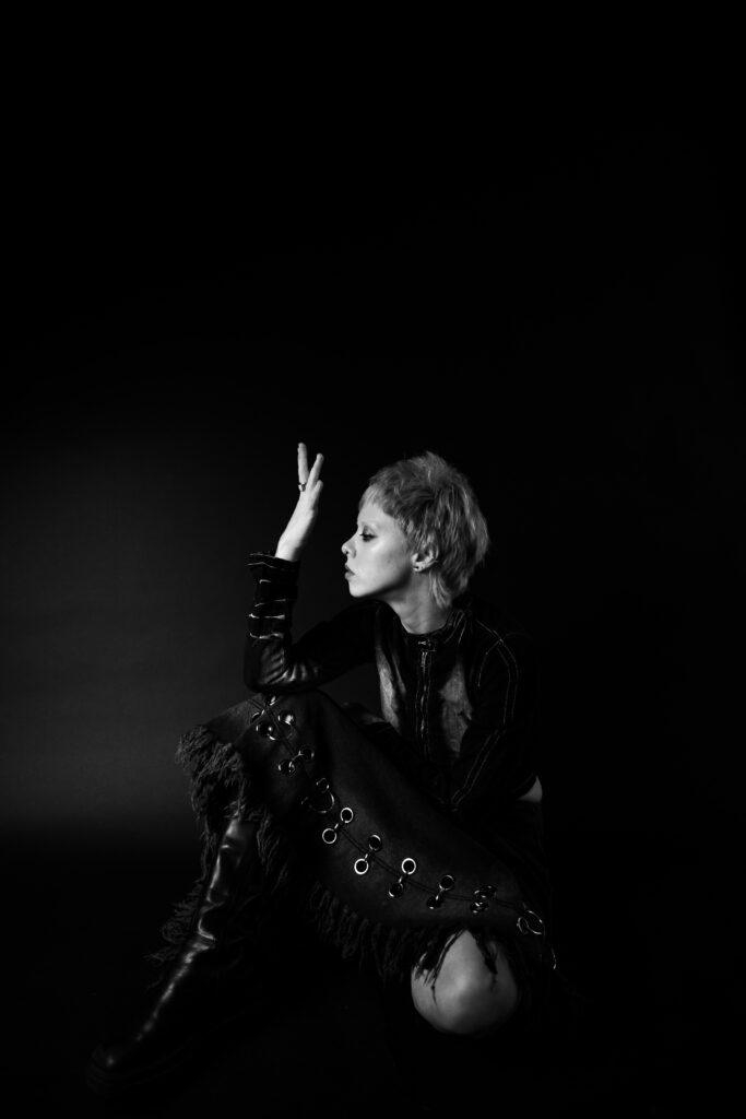Model with short bleached hair, studio test shoot
